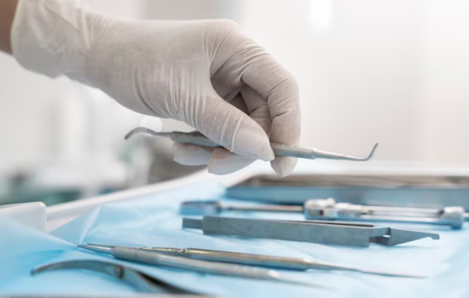 doctor holding surgical tools