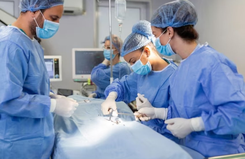 Doctor operating on patient in operating room