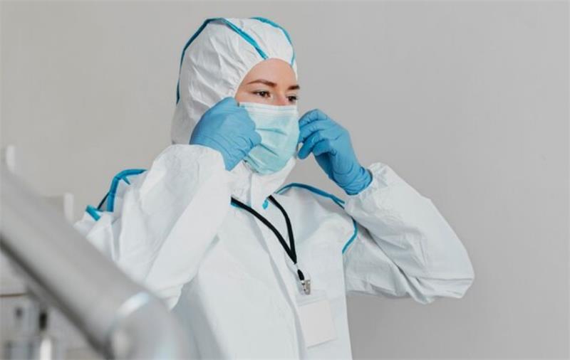 Staff wear protective clothing