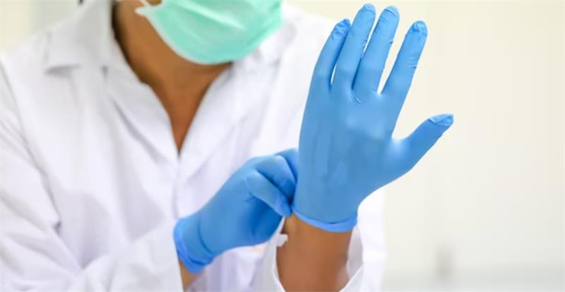 Doctor wearing nitrile gloves